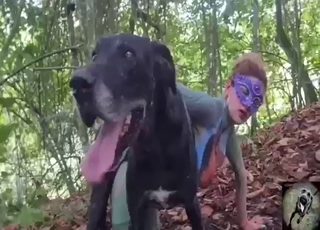 Outdoor fuck movie showing a MILF and her dog