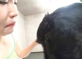 Redheaded Asian wants to taste the asshole of a lovely dog