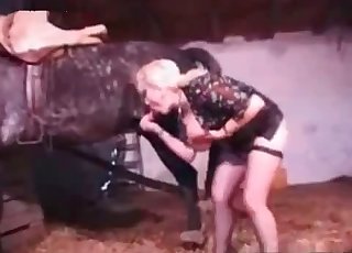 This amazing woman is having sex with a stallion