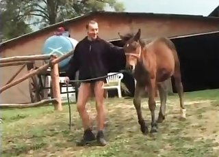 Masculine zoophile is smelling farm animal's butthole