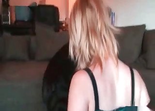 Big black dog railing this girl