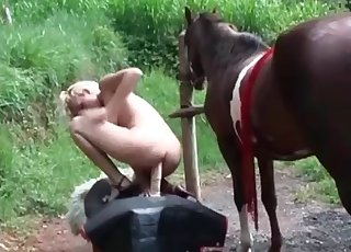 Youthfull blonde sucking a stallion